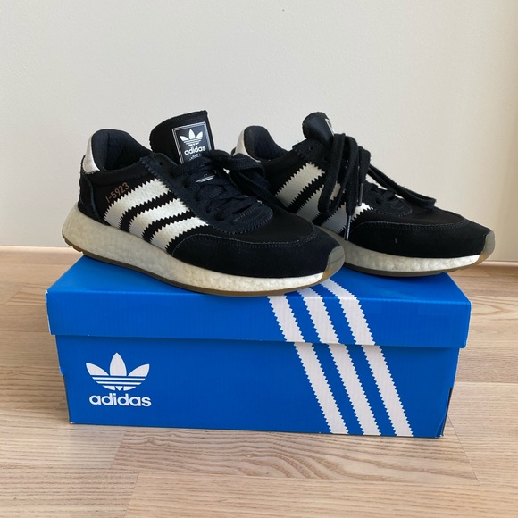 black adidas shoes with gum sole